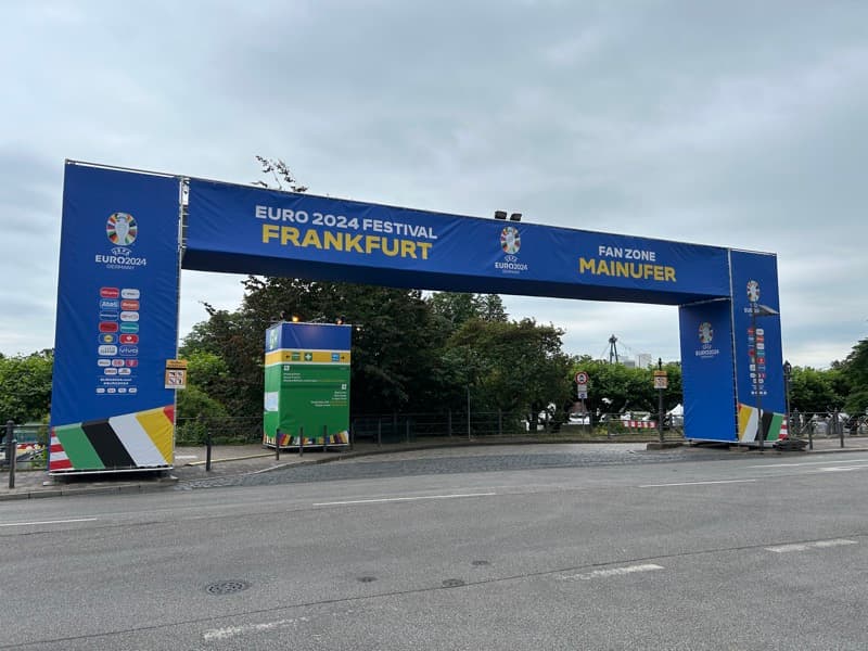 Entrance gate reading “EURO 2024 Festival Frankfurt” and “Fan Zone Mainufer”.