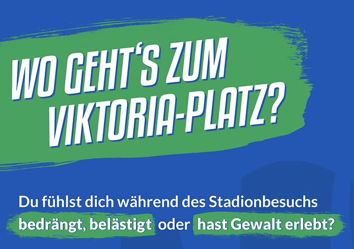 Blue-green informational panel at the 1. FC Magdeburg stadium.